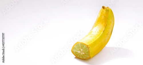 Banana Lemon, with space for copy. Digital imaging betwen banana and lemon. 'Don't judge a book by the cover'.  photo
