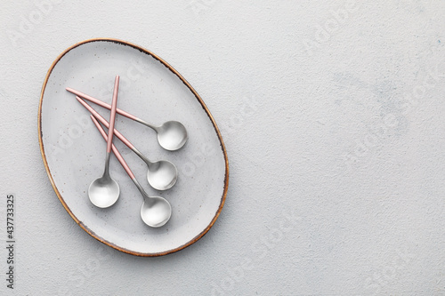 Four modern silver spoons w...