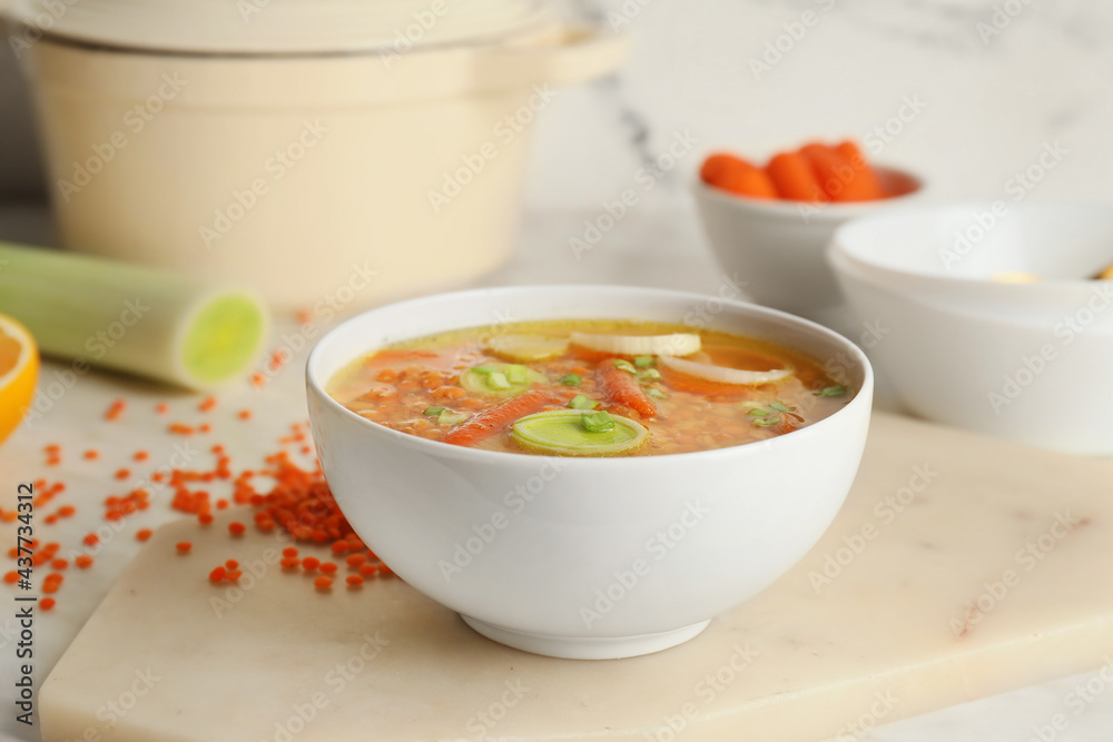 Bowl of tasty lentil soup on table Bowl of tasty lentil soup on table