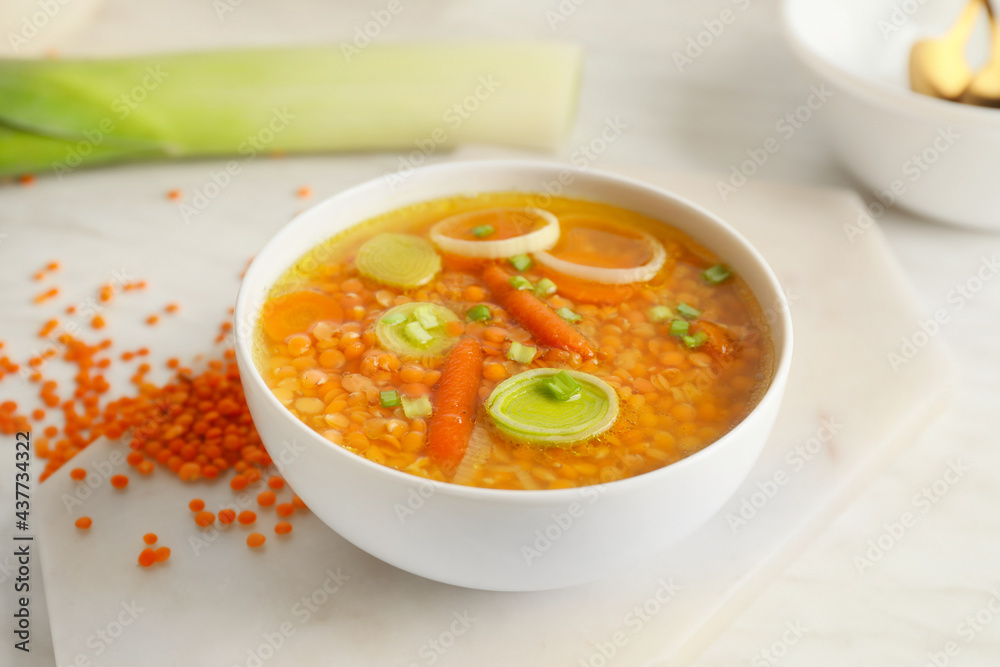 Bowl of tasty lentil soup on table Bowl of tasty lentil soup on table