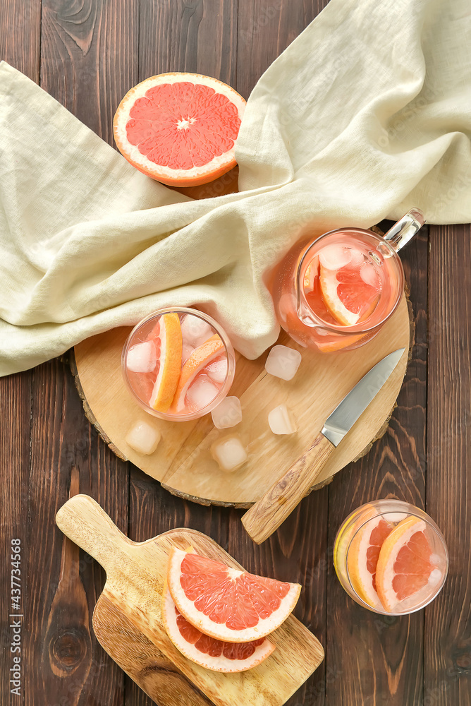 Composition with tasty grapefruit lemonade on wooden background