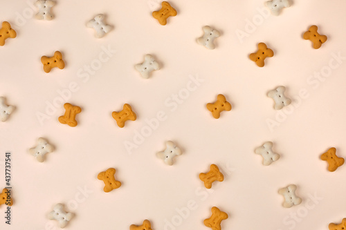 Dry pet food isolated on light background seen from above