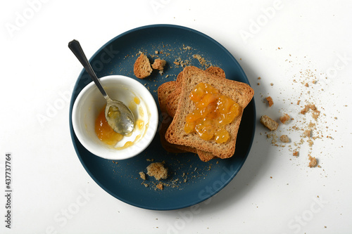 Obraz na plátně apricot jam with rusk for breakfast - closeup