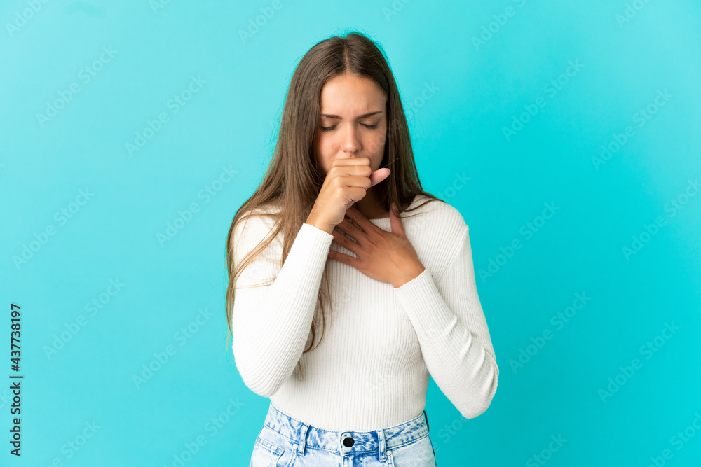 Young woman over isolated blue background coughing a lot Young woman over isolated blue background coughing a lot