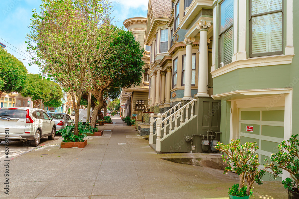 Facades of townhouses with famous Victorian architecture, streets. San Francisco, USA - 17 Apr 2021