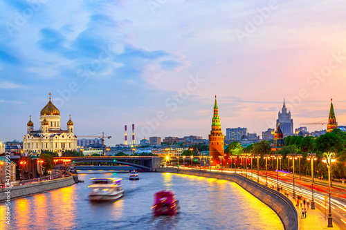 Beautiful sunset over the Moscow River, Cathedral of Christ the Saviour and embankment of the Kremlin. Summer sunset in Moscow, Russia.