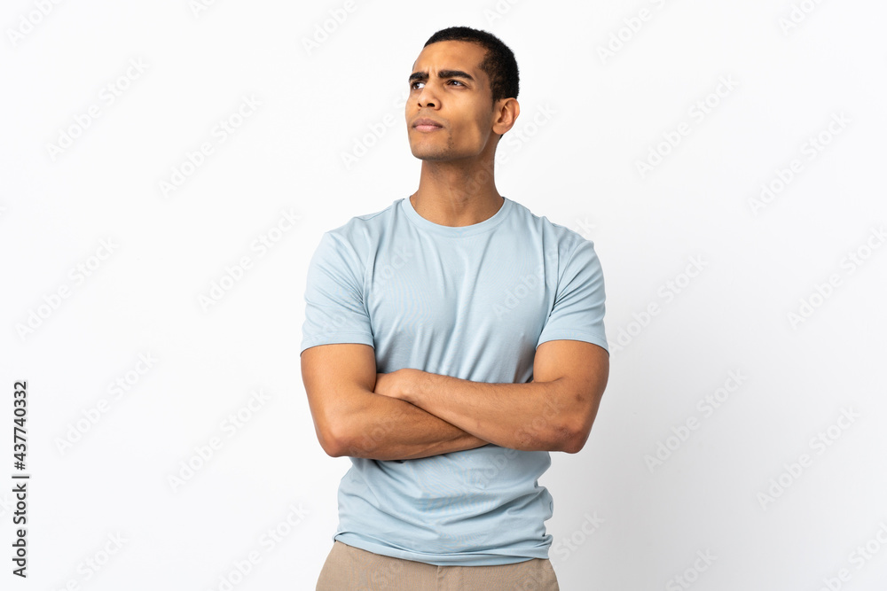 African American man over isolated white background looking to the side African American man over isolated white background looking to the side