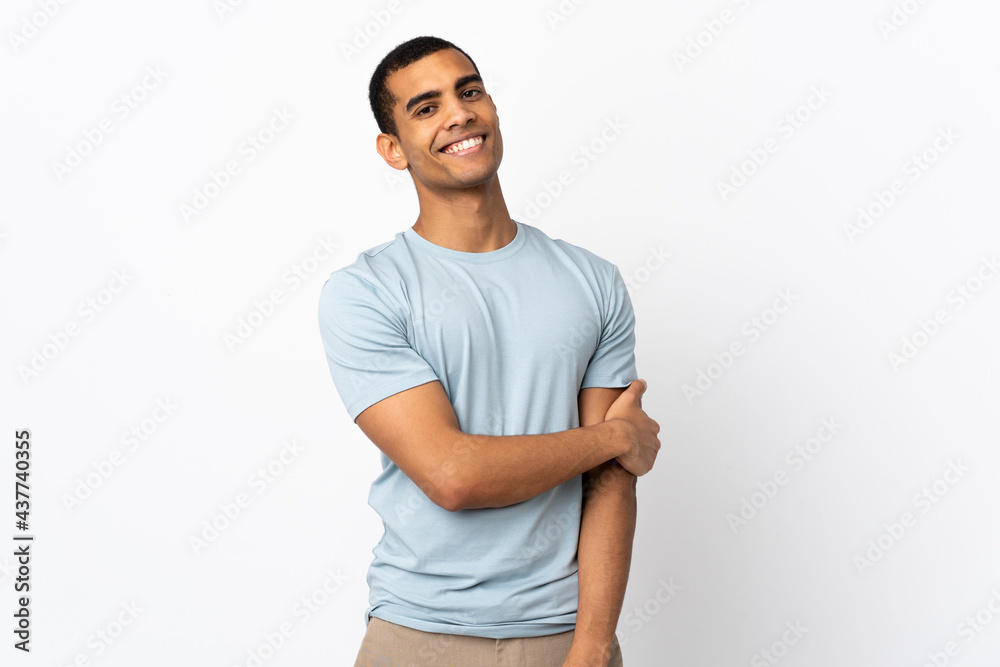Fototapeta premium African American man over isolated white background laughing