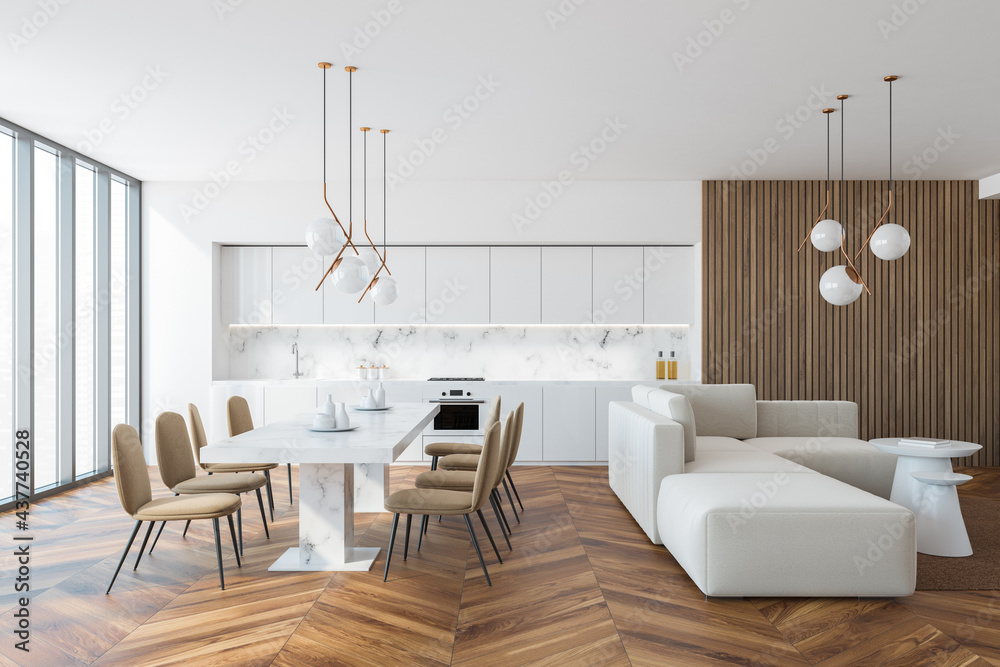 White and wooden kitchen interior with dining table and sofa White and wooden kitchen interior with dining table and sofa