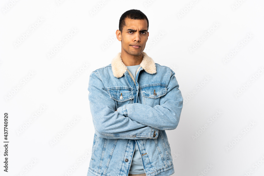 African American man over isolated white background feeling upset African American man over isolated white background feeling upset