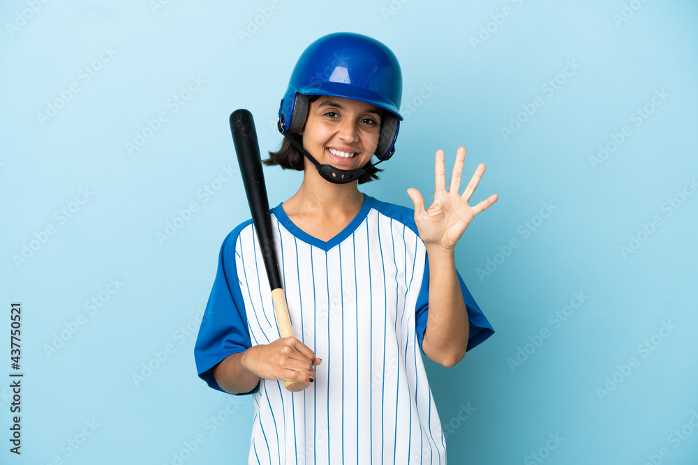 Baseball mixed race player woman with helmet and bat isolated on blue background counting five with fingers Baseball mixed race player woman with helmet and bat isolated on blue background counting five with fingers