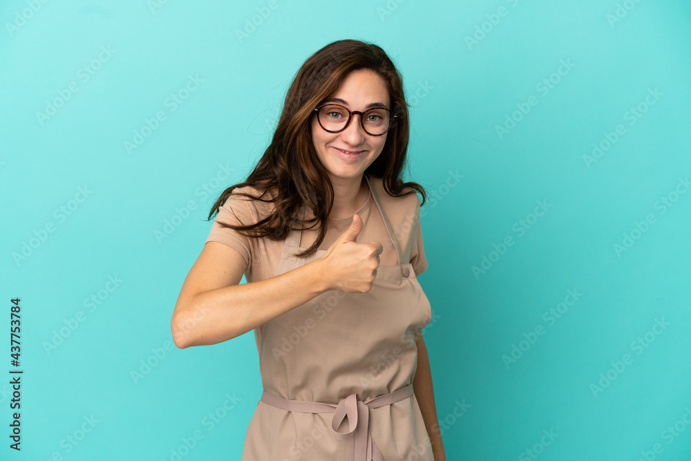 Restaurant waiter giving a thumbs up gesture Restaurant waiter giving a thumbs up gesture