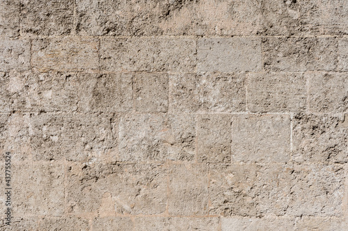 Background texture of a stone wall brown tones