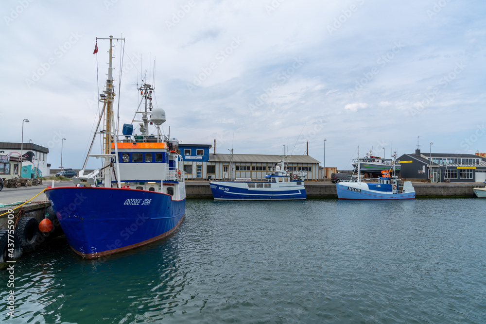 colorful fishing boats in the industrial port and harbor of Hirtshals