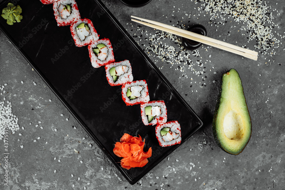 sushi roll california with shrimp, avocado and cheese. Traditional japanese sushi sushi roll california with shrimp, avocado and cheese. Traditional japanese sushi