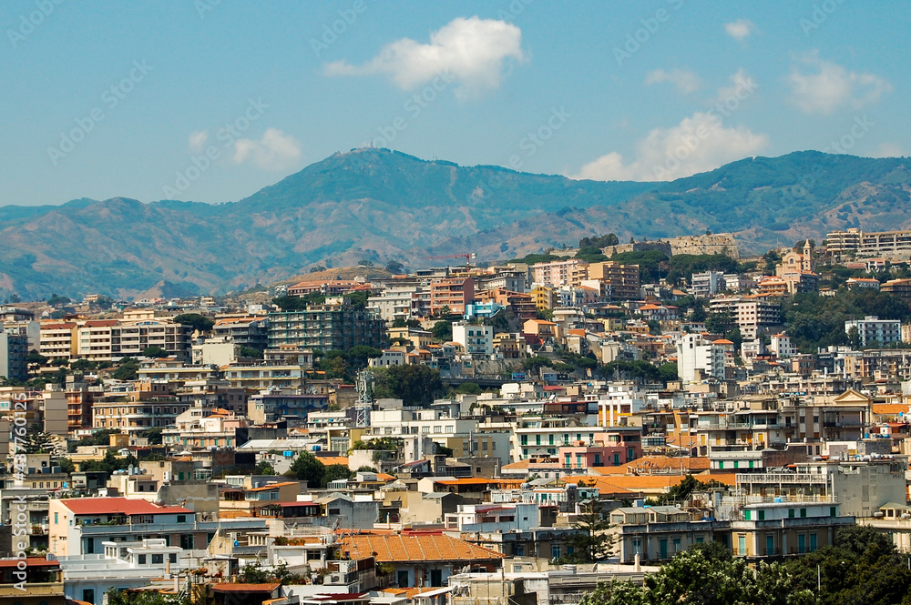 view of the city, coastal city, colorful buildings, mountains