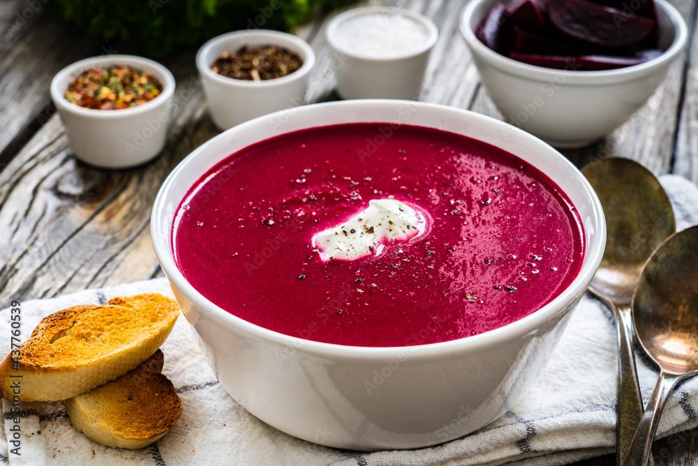 Beetroots cream soup on wooden table
Beetroots cream soup on wooden table