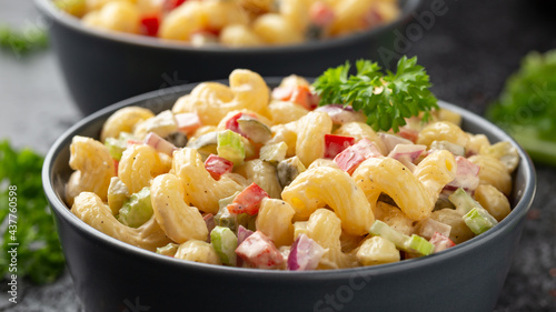 Macaroni Salad with red bell pepper, onion, celery, gherkins and mayonnaise dressing