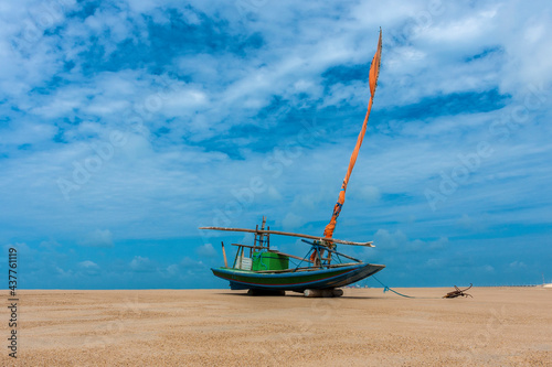 RAFT ANCHORED ON TAIBA BEACH WEST COAST OF THE STATE OF CEARÁ, NORTHEASTERN BRAZIL.