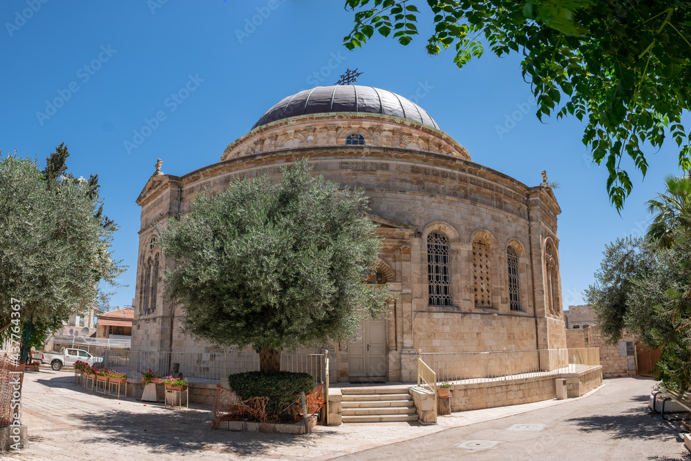 Naklejka premium Ethiopian Orthodox church named the Kidane Mehret Church, located in Ethiopia street in Jerusalem. The biggest and the most distinctive Ethiopian site at the holy land. Olive tree at the foreground.