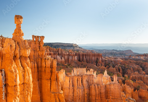 Hoodoos and canyons - red painted faces around the rims of the chilling Bryce Canyon National Park