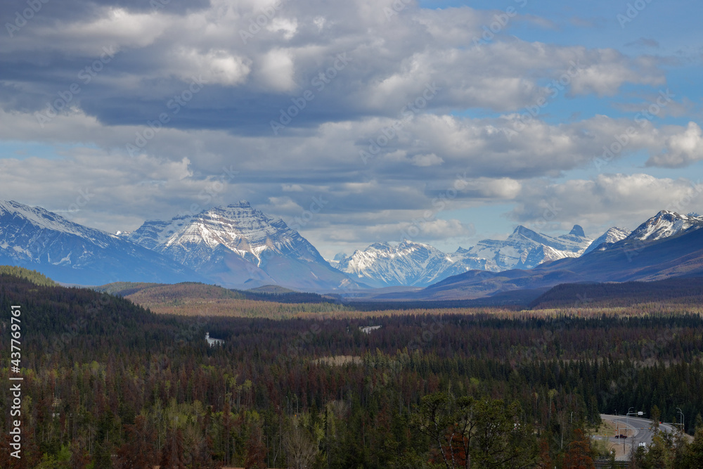 Rocky mountains near Jasper National Park, cloudy and high contrast image