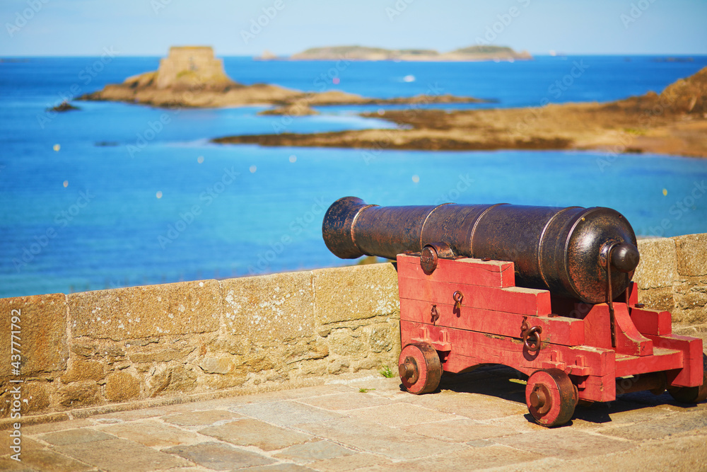 Old canon on the fortress wall surrounding Saint-Malo Intra-Muros in Saint-Malo, France