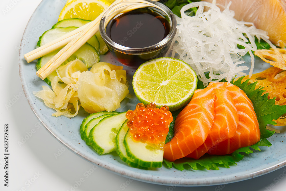sashimi set, Japanese food. sushi restoran menu. Japanese seafood. sashimi set on plate with cucumber and salad. Takea way sashimi set.