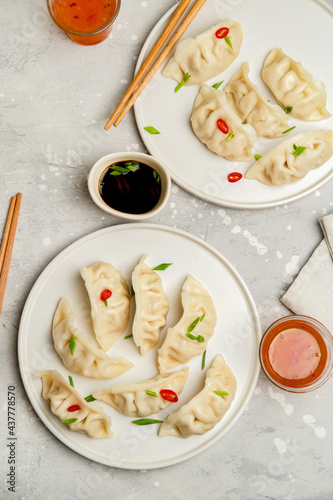 Take out food. Gyoza dumplings with soy sauce. 