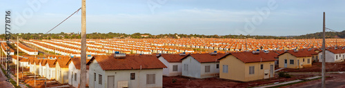 Panorama of a neighborhood with many identical popular houses