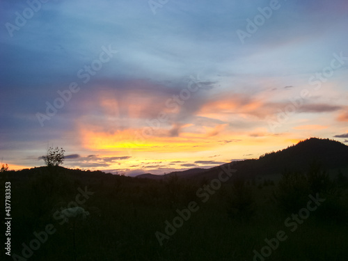 A beautiful sunset in the small bor tract. Khakassia, russia. photo