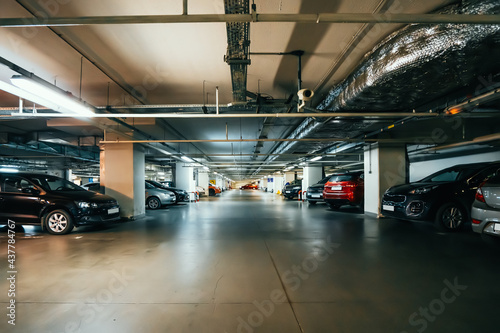 Underground garage or modern car parking in mall.