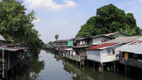 Life along Prem Prachakon canal river Don Mueang Bangkok Thailand. photo