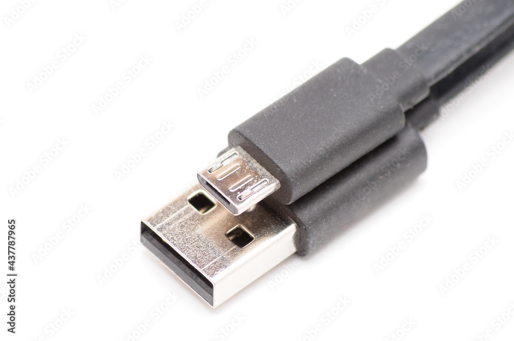 Micro USB cord USB adapter on white background Micro USB cord USB adapter on white background
