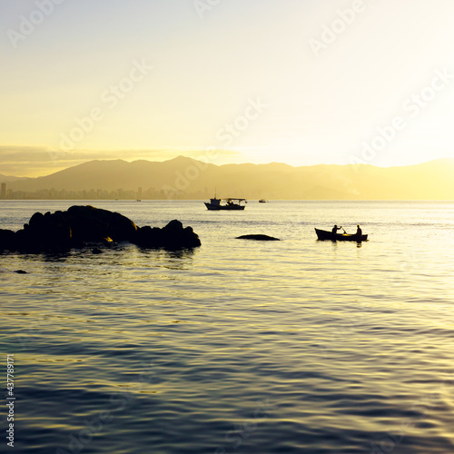 Fishing boats at the sunset on Balneário Camboriú, Santa Catarina, Brazil