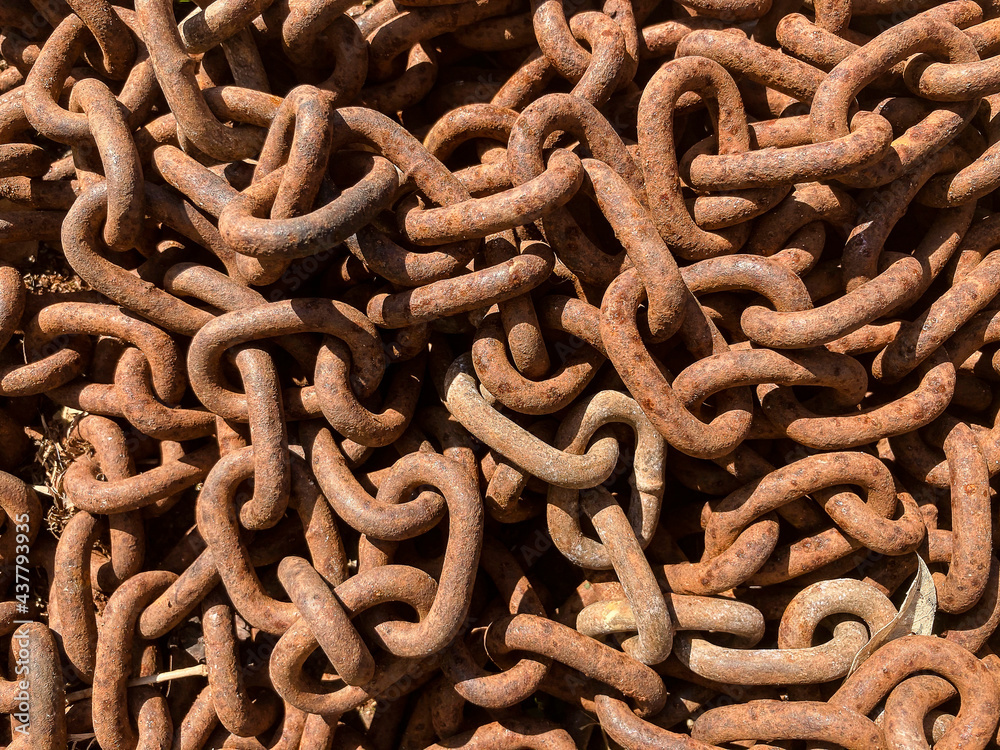Close up of an old rusted and piled up iron chain. Close up of an old rusted and piled up iron chain.
