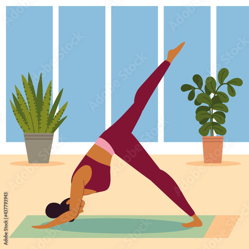 girl doing yoga at home