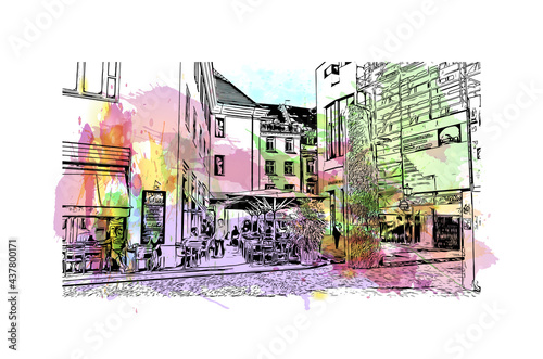 Building view with landmark of Freiburg is the 
city in Germany. Watercolor splash with hand drawn sketch illustration in vector.