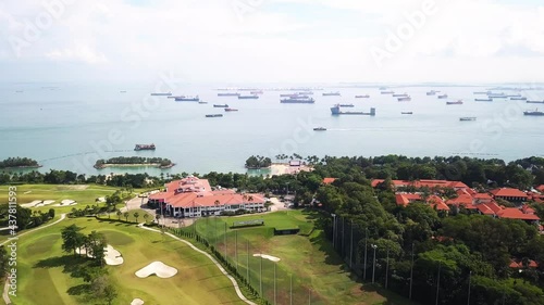 Sentosa Singapore cargo ships drone shot ocean 4k aerial shot Tanjong golf course  Tanjong beach Cruise ship high in the sky latitude photo