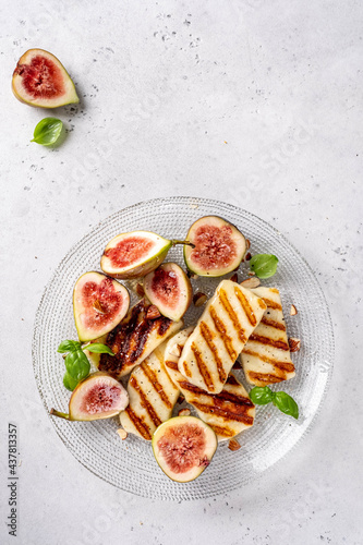 Grilled Halloumi Cheese, fresh figs fruit, almonds and honey