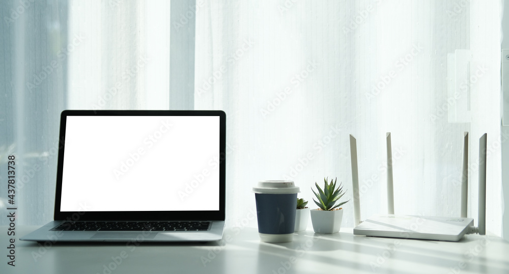 Workspace desk and laptop.Business image, Blank screen laptop and supplies. Workspace desk and laptop.Business image, Blank screen laptop and supplies.