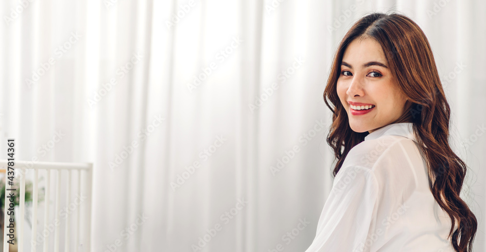 Portrait of smiling cheerful beautiful pretty asian woman clean fresh healthy white skin posing in pajamas white clothes.Girl felling relaxing and enjoy time on the bed at home.asia beauty Portrait of smiling cheerful beautiful pretty asian woman clean fresh healthy white skin posing in pajamas white clothes.Girl felling relaxing and enjoy time on the bed at home.asia beauty