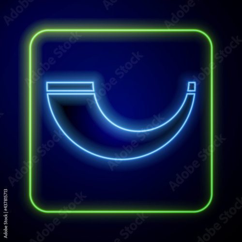 Glowing neon Traditional ram horn, shofar icon isolated on blue background. Rosh hashanah, jewish New Year holiday traditional symbol. Vector