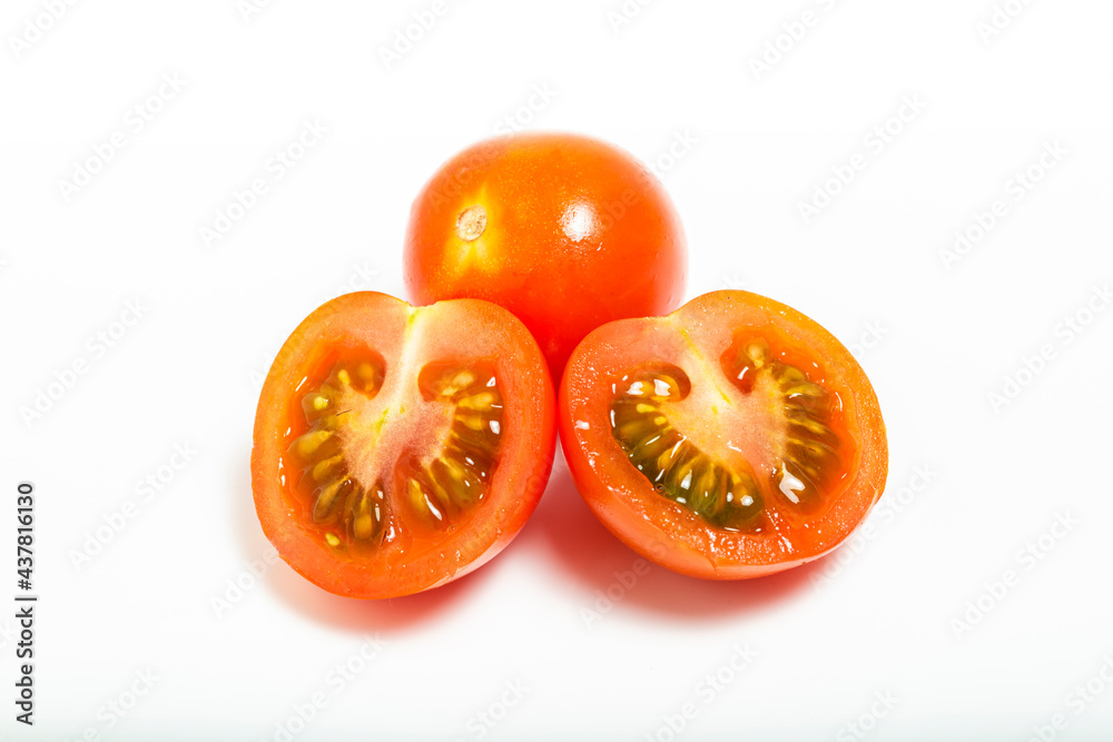 Tomato cherry isolated on white background. Top view. Macro photograpy Tomato cherry isolated on white background. Top view. Macro photograpy