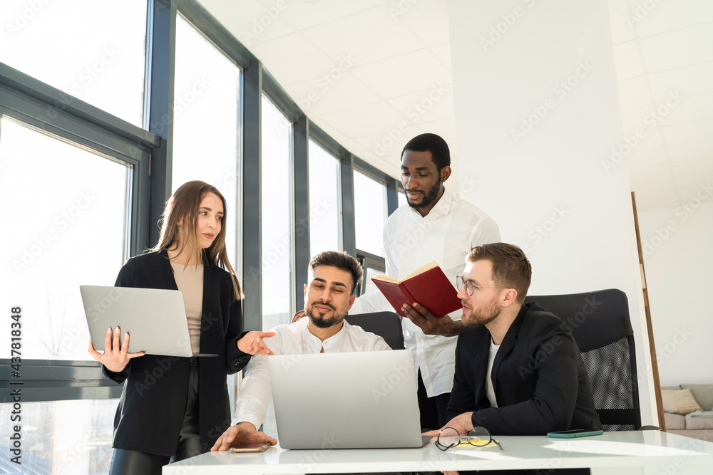 Group of multiracial people company employees working on laptops Group of multiracial people company employees working on laptops