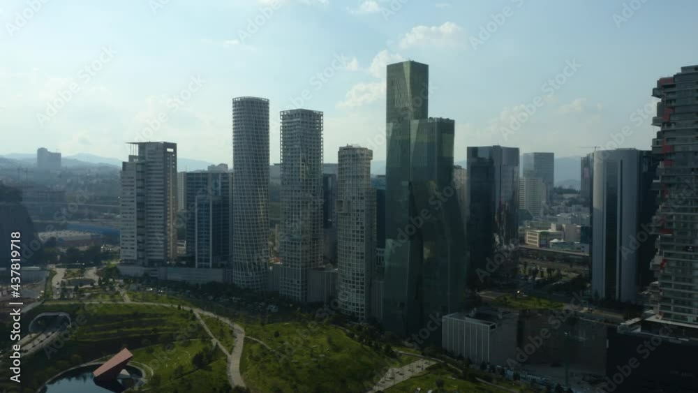 Skyscrapers Overlooking La Parque Mexicana in Santa Fe, Mexico City. Beautiful Push In Establishing Shot Skyscrapers Overlooking La Parque Mexicana in Santa Fe, Mexico City. Beautiful Push In Establishing Shot