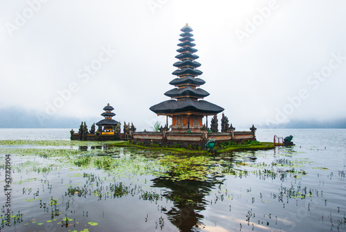 pura ulun danu bratan hindu temple on bratan lake in bali, cloudy rainy weather