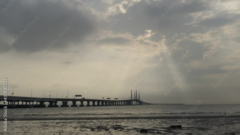 TImelapse dramatic sunray at Penang Second Bridge in day TImelapse dramatic sunray at Penang Second Bridge in day