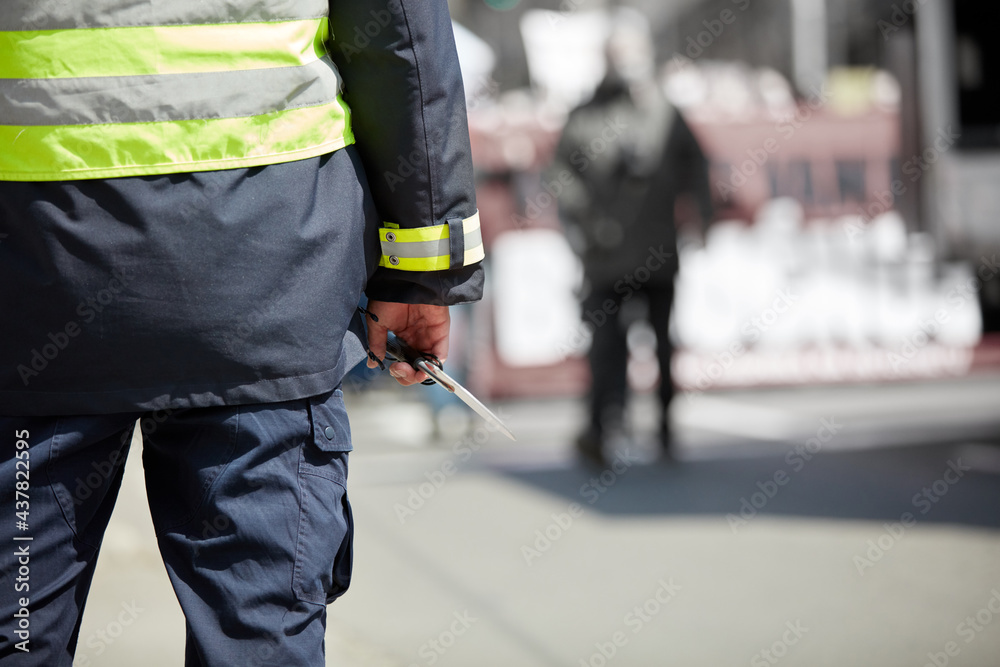 Police officer on the street in urban environment. Police officer on the street in urban environment.