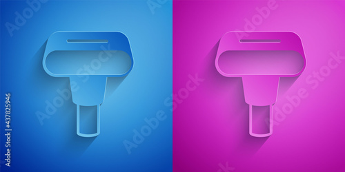 Paper cut Portable home and travel garment steamer for clothes icon isolated on blue and purple background. Paper art style. Vector